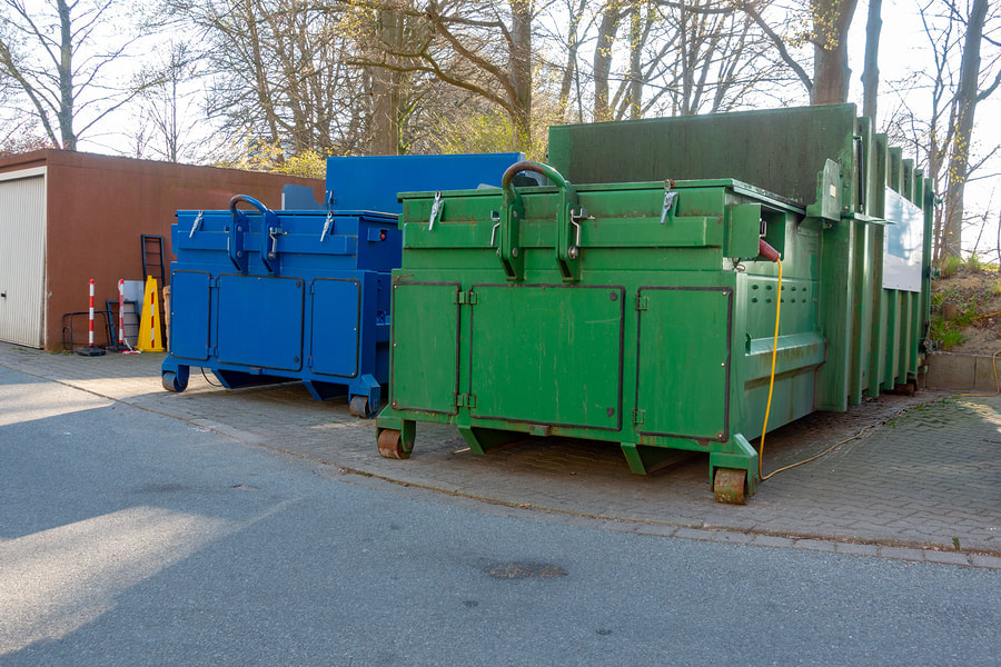 a metal dumpster bins